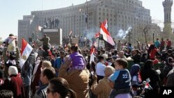 Crowds turn out to celebrate Friday in Cairo's Tahrir Square, marking the success of a popular uprising and honoring the protesters who were killed, February 18, 2011