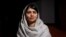 FILE - Nobel Peace Prize winner Malala Yousafzai poses for a portrait during an interview with Reuters after the 21st Nelson Mandela Annual Peace Lecture on the tenth anniversary of his death, in Johannesburg, South Africa, December 5, 2023. 