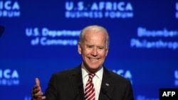 FILE - Then-US VP Joe Biden speaks during US-Africa Business Forum on the sideline of the US-Africa Leaders Summit in Washington, Aug. 5, 2014. 