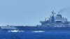 Japan says Chinese carrier entered its contiguous waters for first time