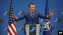 U.S. Secretary of Defense Pete Hegseth speaks during a media conference after a meeting of NATO defense ministers at NATO headquarters in Brussels on Feb. 13, 2025.