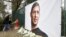 Bouquets of flowers and other tributes displayed near a photo of Argentine footballer Emiliano Sala outside the training grounds of the French club Nantes, on Thursday, January 24, 2019. (AP Photo) 