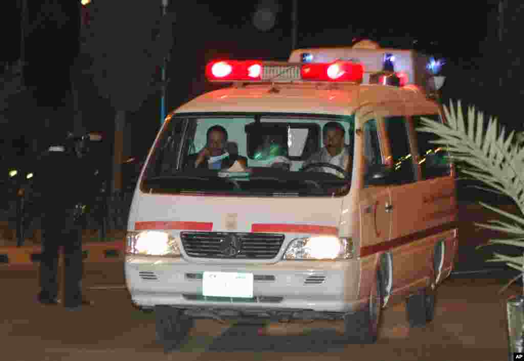 A Yemeni Ambulance carrying the bodies of two Belgian women at Sana'a airport, Yemen, Jan. 18, 2008. Gunmen believed to be al-Qaida militants opened fireon a tourist convoy in eastern Yemen. (AP Photo/ Mohammed al-Qadhi)