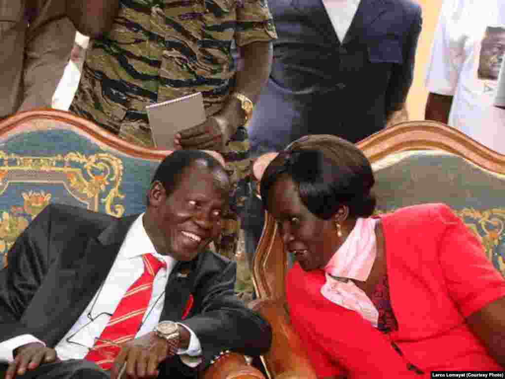 South Sudan's new vice president, James Wani Igga, speaks with Rebecca Nyandeng, widow of the late rebel leader and first vice president of South Sudan, John Garang. 
