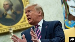 President Donald Trump speaks during a meeting in the Oval Office of the White House, Dec. 13, 2019.