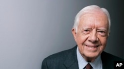 FILE - Former President Jimmy Carter poses for a portrait during the Toronto International Film Festival, Sept. 10, 2007, in Toronto. (AP Photo/Carolyn Kaster, File)