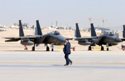 FILE - F-15SA fighter jets are seen during a graduation ceremony and air show marking the 50th anniversary of the founding of King Faisal Air College in Riyadh, Saudi Arabia, Jan. 25, 2017.