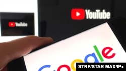 Photo by: STRF/STAR MAX/IPx 2021 2/3/21 Google stock price soars on strong earnings from YouTube Ad revenue. STAR MAX Photo: Google and Youtube logos photographed on Apple devices.