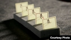 This five-cell metamaterial array developed by Duke engineers converts stray microwave energy, as from a WiFi hub, into more than 7 volts of electricity with an efficiency of 36.8 percent—comparable to a solar cell. (Duke)