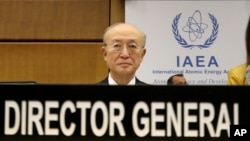 Director General of the International Atomic Energy Agency, IAEA, Yukiya Amano of Japan, waits for the start of the IAEA board of governors meeting at the International Center in Vienna, Austria, Nov. 22, 2018.