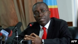 FILE - Democratic Republic of Congo's Prime Minister Augustin Matata Ponyo is seen speaking during a press conference in Kinshasa, DRC, April 19, 2012. He and his government resigned Monday as part of a controversial political deal extending the presidency of Joseph Kabila.