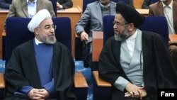 محمود علوی، وزیر اطلاعات در کنار حسن روحانی رئیس جمهوری اسلامی ایران