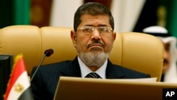 FILE - Egyptian President Mohamed Morsi, Jan. 21, 2013. 