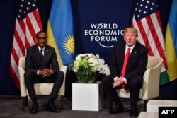 FILE - U.S. President Donald Trump, right, and Rwandan President President Paul Kagame attend a bilateral meeting on the sideline of the annual meeting of the World Economic Forum in Davos, Switzerland, Jan. 26, 2018.