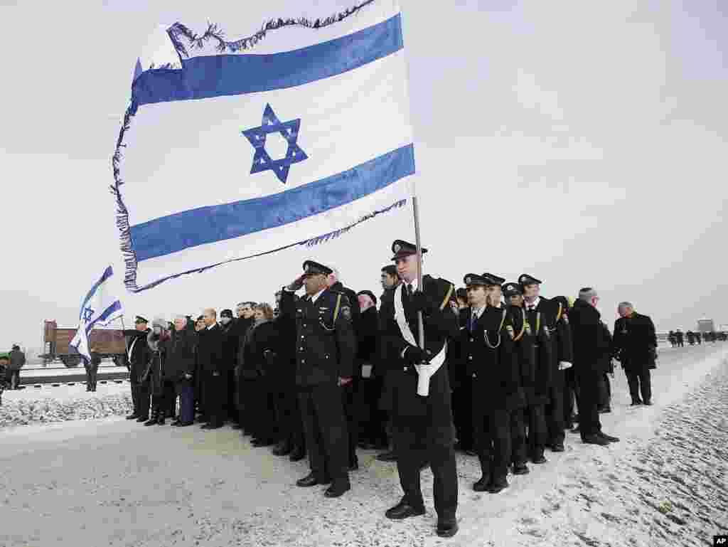Members of Israeli parliament, the Knesset, attend a ceremony to mark the 69th anniversary of the liberation of the Auschwitz death camp in Oswiecim, Poland. The Nazis killed some 1.5 million people, mostly Jews, at the camp during World War II.