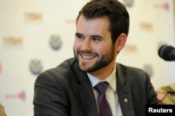 FILE - Zach Wahls, executive director of Scouts for Equality, a pro-gay organization, fields questions at a news conference in Grapevine, Texas, May 23, 2013.