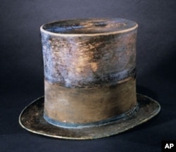 Top hat worn by Abraham Lincoln to Ford's Theatre on the night of his assassination.