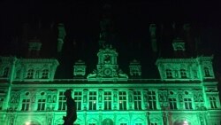 The City Hall of Paris, France is illuminated in green, June 1, 2017, following the announcement by US President Donald Trump that the United States will withdraw from the 2015 Paris accord and try to negotiate a new global deal on climate change.