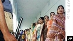 Women wait in line to vote in previous Bangladesh elections.