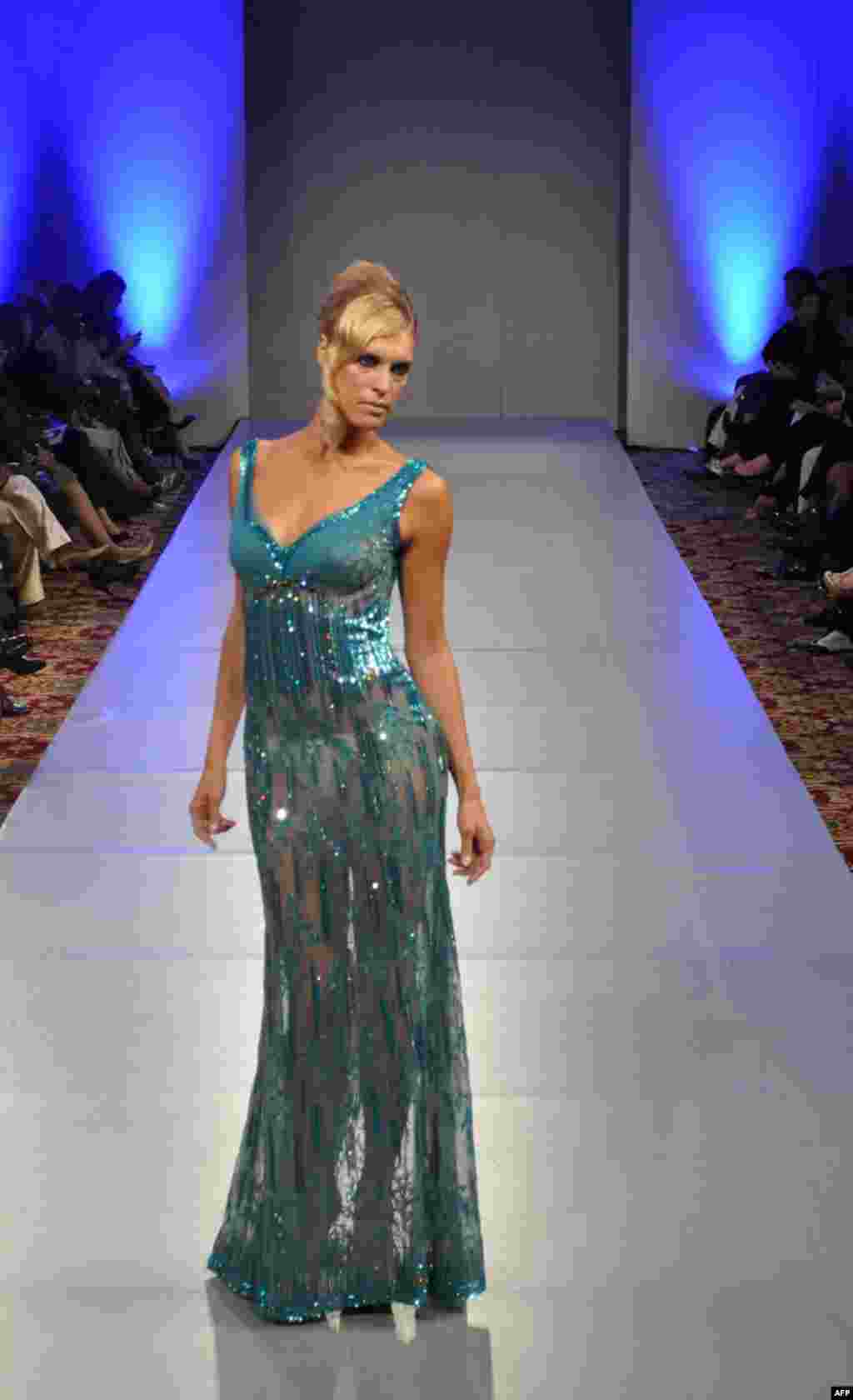 Дизайнер Mireille Dagher