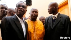 Singer Youssou N'dour (left) announced his support for opposition leader Macky Sall's presidential candidacy in 2012.