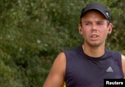 FILE - Andreas Lubitz runs the Airportrace half marathon in Hamburg in this Sept. 13, 2009 file photo.