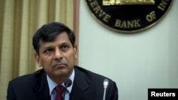 FILE - Reserve Bank of India (RBI) Governor Raghuram Rajan listens to a question at a news conference after the bi-monthly monetary policy review in Mumbai, India, June 2, 2015. 