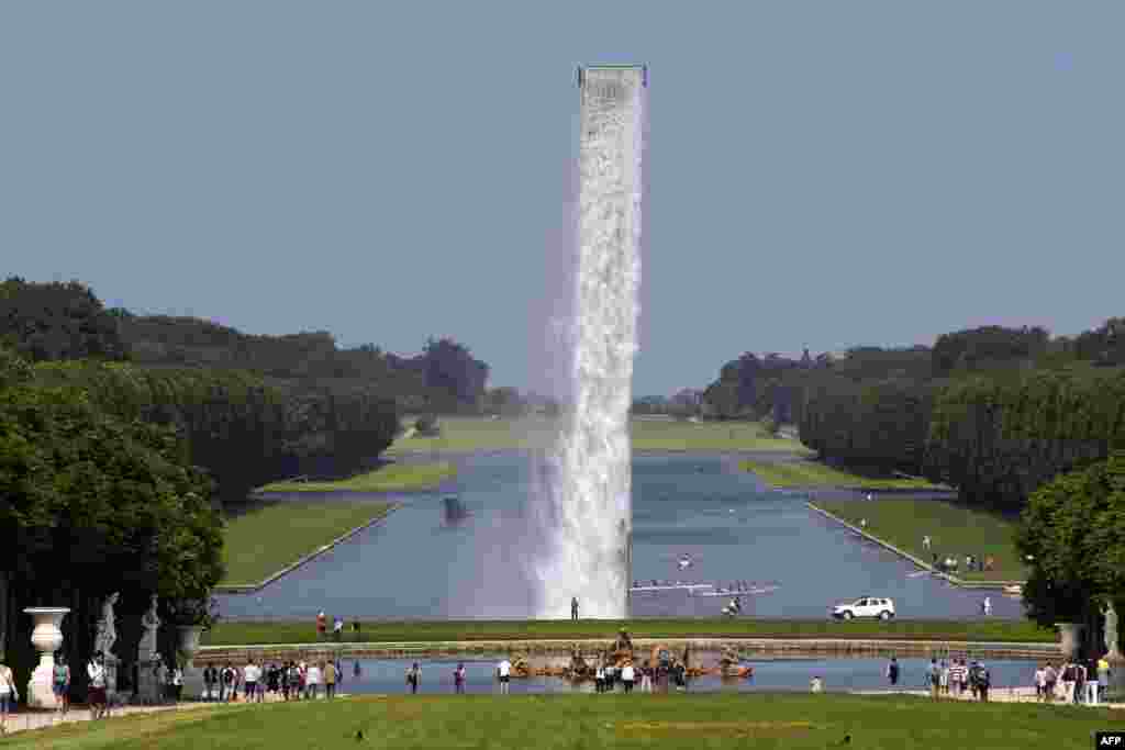 &quot;Waterfall&quot; installation by Danish artist Olafur Eliasson in the gardens of the Chateau de Versailles, southern Paris, France.