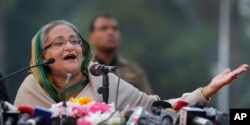 FILE - Bangladesh's Prime Minister Sheikh Hasina speaks during a press conference in Dhaka.
