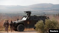 Members of Turkish police special forces are seen near Mount Barsaya in Qastal village, Azaz city, Syria, Feb. 1, 2018. 