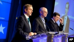 From left: Irish Prime Minister Enda Kenny, European Council President Herman Van Rompuy and European Commission President Jose Manuel Barroso participate in a media conference at an EU summit in Brussels, June 28, 2013.