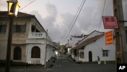 In this Friday, May 10, 2019, photo, a street that is usually crowded with tourists is seen empty in Galle, Sri Lanka. (AP Photo/Eranga Jayawardena)