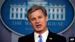 FBI Director Christopher Wray speaks during the daily press briefing at the White House, Aug. 2, 2018, in Washington. 