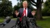 President Donald Trump speaks to the media on the South Lawn of the White House in Washington, May 23, 2018, en route to a day trip to New York. 