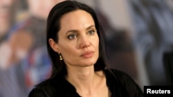 FILE - United Nations High Commissioner for Refugees (UNHCR) Special Envoy Angelina Jolie attends a news conference as she visits a Syrian and Iraqi refugee camp in the southern Turkish town of Midyat in Mardin province, Turkey, June 20, 2015. 