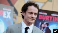 FILE - In this June 11, 2015, file photo, Anton Yelchin arrives at a special screening of "Burying the Ex" held at Grauman's Egyptian Theatre in Los Angeles. Yelchin, a charismatic and rising actor best known for playing Chekov in the new "Star Trek" films, has died at the age of 27. He was killed in a fatal traffic collision early Sunday morning, June 19, 2016, his publicist confirmed. 