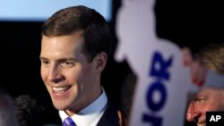 Conor Lamb, the Democratic candidate for the March 13 special election in Pennsylvania's 18th Congressional District celebrates with his supporters at his election night party in Canonsburg, Pa., March 14, 2018. 