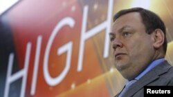 FILE - Mikhail Fridman, chairman of the supervisory board of the Alfa Group Consortium, attends a ceremony at the Moscow Exchange in Moscow, Russia Feb. 1, 2018. Fridman, Alfa Bank's founder, has an estimated net worth of $14 billion, according to Forbes' real-time wealth estimator.