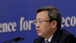 Phó Bộ trưởng Thương mại Trung Quốc Vương Thụ Văn tham dự cuộc họp báo bên lề đại hội đại biểu nhân dân toàn quốc ở Bắc Kinh, Trung Quốc, ngày 9 tháng 3, 2019.