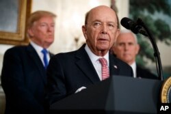 FILE - Secretary of Commerce Wilbur Ross speaks during an event to announce tariffs and investment restrictions on China, in the Diplomatic Reception Room of the White House, March 22, 2018.