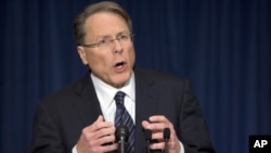 The National Rifle Association executive vice president Wayne LaPierre, gestures during a news conference in response to the Connecticut school shooting, Washington, December 21, 2012. 