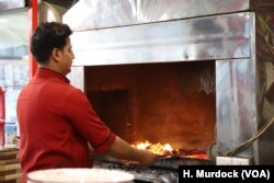 “They just went to the restaurant to get some food,” says Ali, a 24-year-old father who cooks kebabs for a living, describing a nearby attack on a local restaurant that killed three people. “And now they are dead.” Ali is pictured in Mosul, Iraq, Nov. 26, 2018.