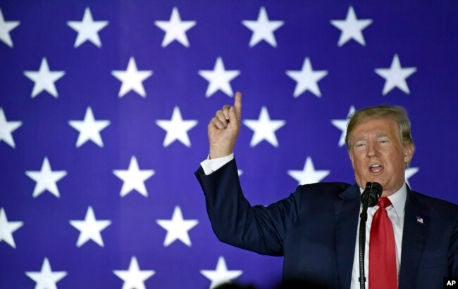 President Donald Trump speaks at a fundraiser in Fargo, N.D., Sept. 7, 2018.