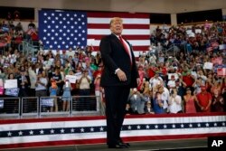 El presidente Donald Trump durante un acto de campaña en Erie Insurance Arena, en Erie, Pensilvania, el miércoles, 10 de octubre de 2018.