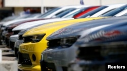 A group of Chevrolet Camaro cars for sale is pictured at a car dealership in Los Angeles, California, April 1, 2014.
