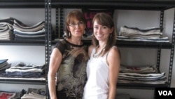 Charlotte Ferguson (left) is working for her daughter Alexandra's home decorating business. (VOA/A. Milne-Tyte)