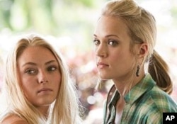 AnnaSophia Robb and Carrie Underwood in "Soul Surfer"