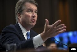 FILE - Judge Brett Kavanaugh testifies during the second day of his U.S. Senate Judiciary Committee confirmation hearing on Capitol Hill in Washington, Sept. 5, 2018.