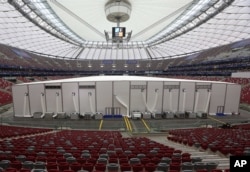 A tent stands ready to welcome the heads of the 28 NATO members and other officials for a NATO summit at the National Stadium in Warsaw, Poland, Thursday, July 7, 2016.