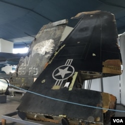 The wreckage of a U.S. F-117A Stealth bomber downed during NATO's 1999 bombing campaign, on display at Belgrade's aeronautical museum. (Photo: L. Ramirez / VOA)